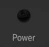 A small round hole. The power supply cable plugs into it.